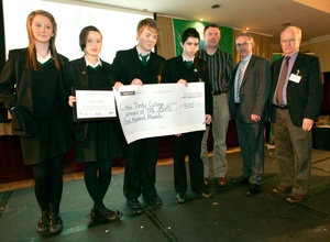 Students and teacher from Holy Trinity College, Cookstown, first prize, with Minister Alex Attwood and Robert Emmet Hernan, “irish environment” magazine.